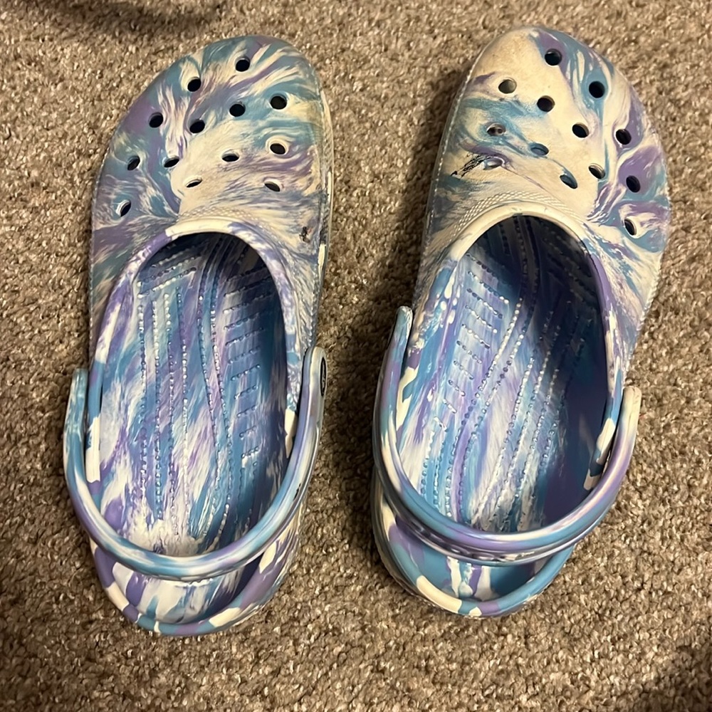 White purple, blue tie-dye crocs. Super cute.